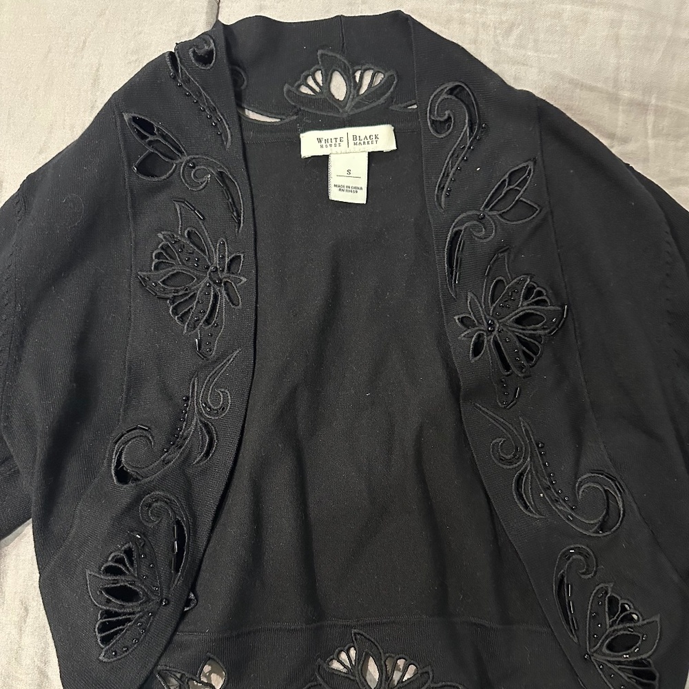 White House Black Market Shrug